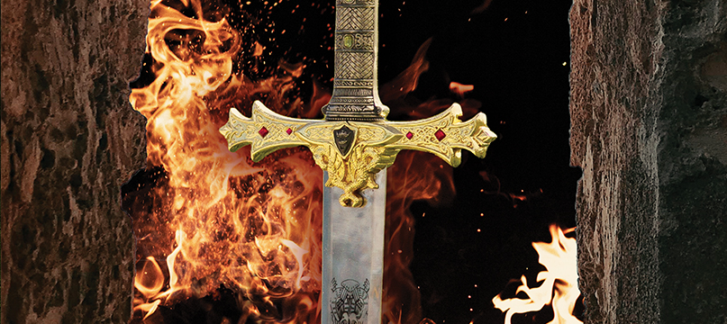 campaign artwork for Il Trovatore of a sword surrounded by flames and stone walls